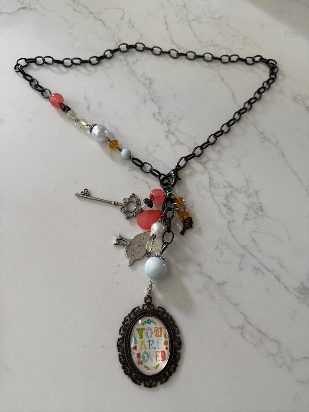 Plunder Black Chain Necklace with Pink, White, Blue & Gold Accents